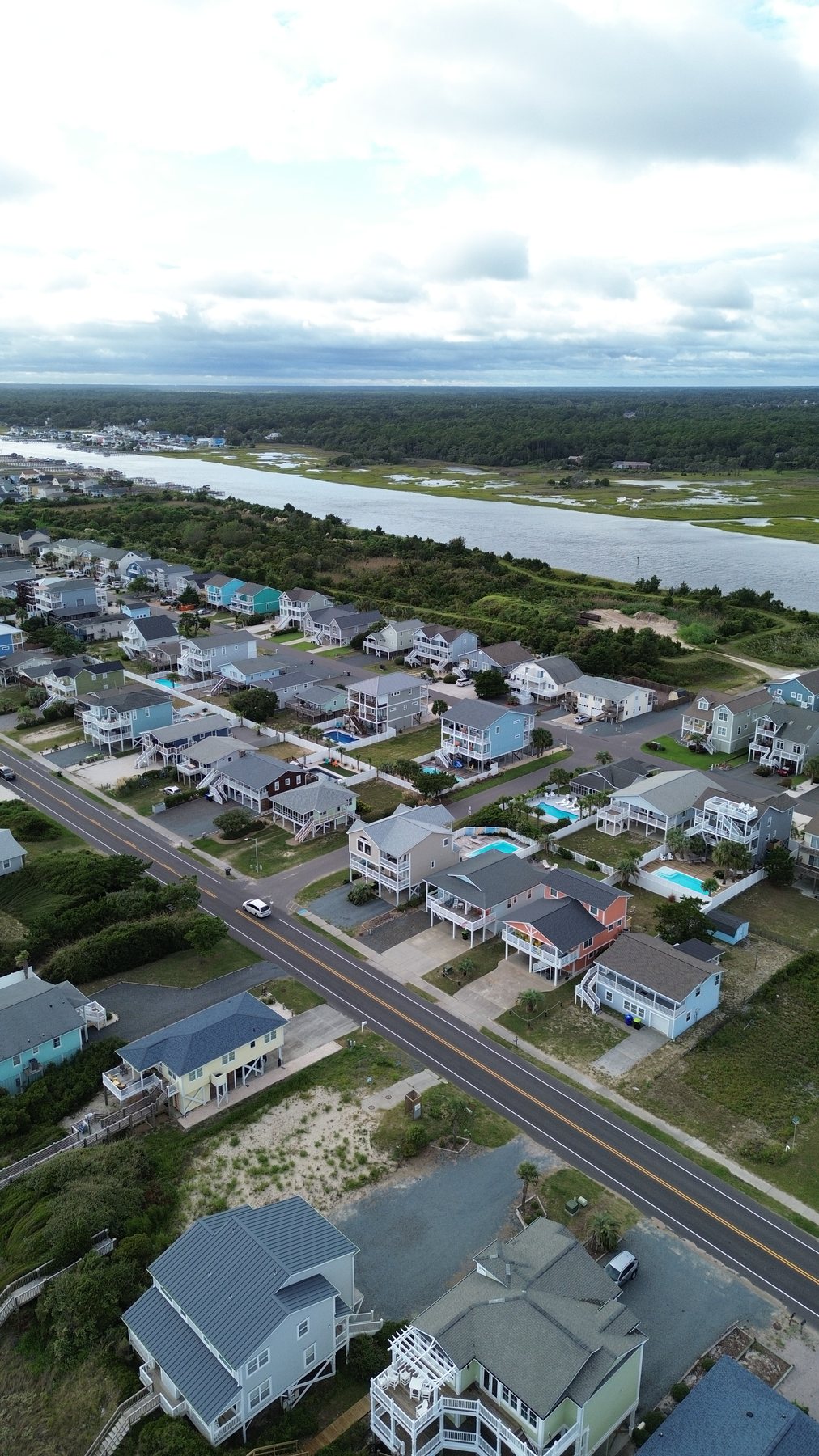 Aerial view of a coastal North Carolina beach community and tidal marsh